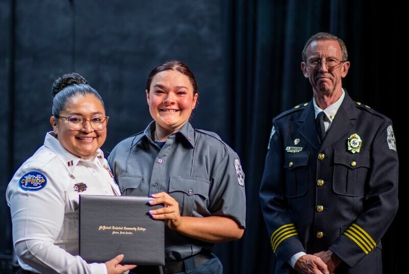 Student receives certificate