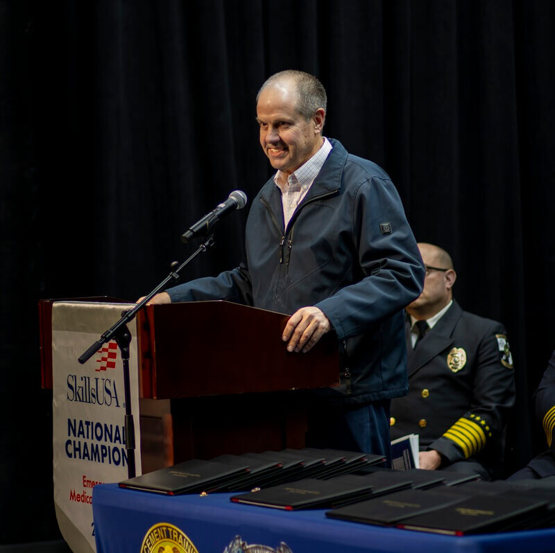 Chip Cross at podium