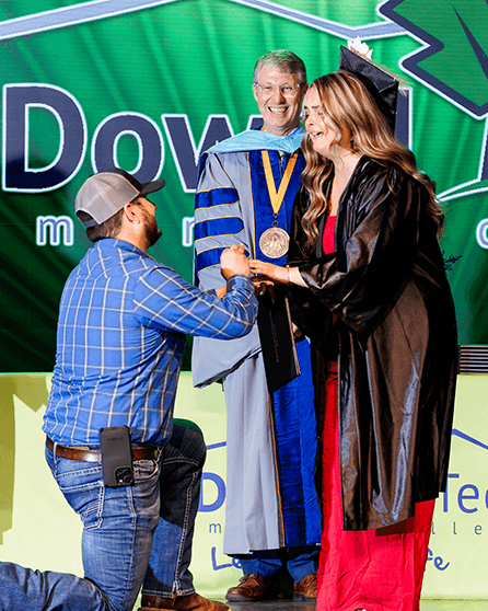 Proposal on stage during the graduation ceremony 2025